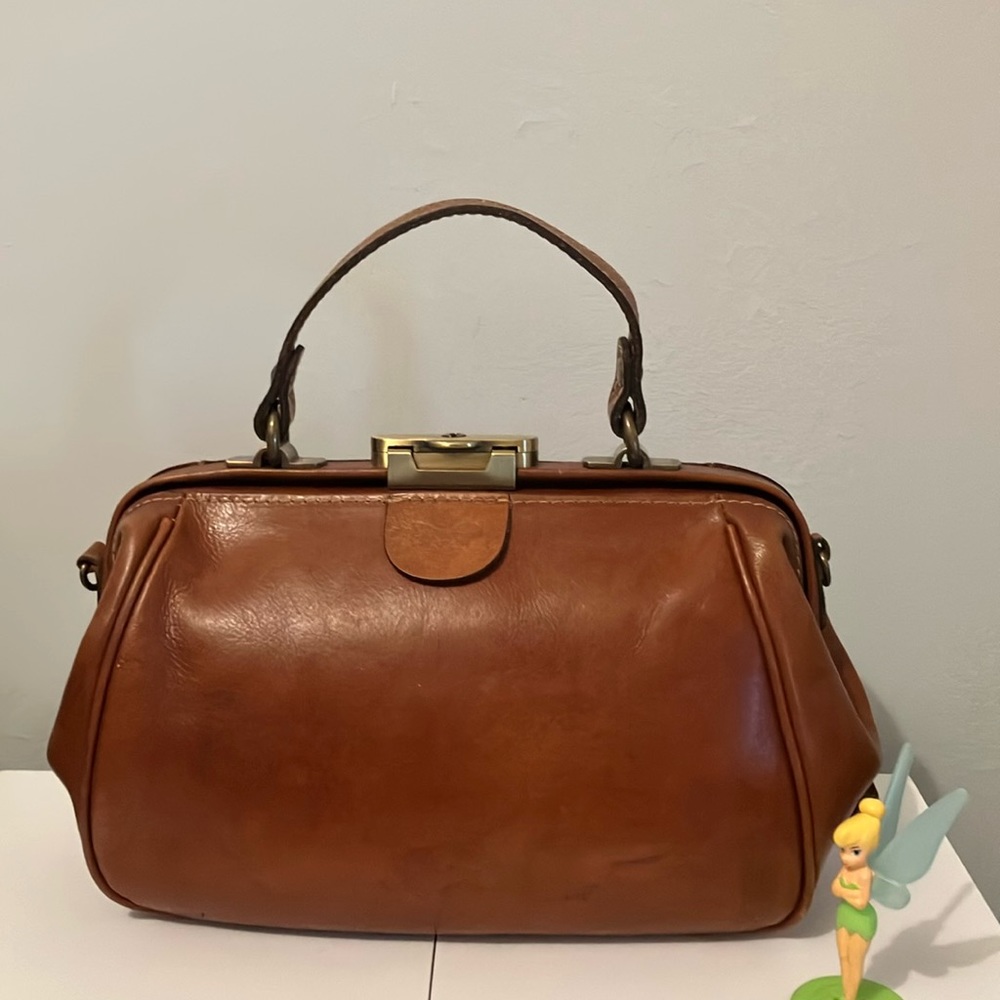 Beautiful Patricia Nash designer Hand and Crossbody Bag.